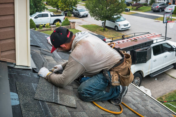 Professional Flat Roof Repair technician working in Richwoods, MO